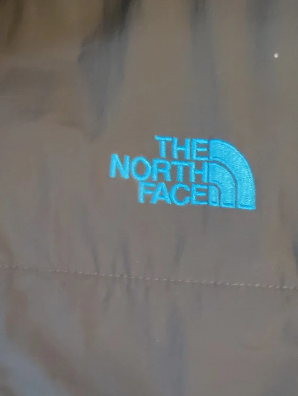 The North Face Two-Tone Gray and Black Denali Fleece Jacket with Blue Accents
